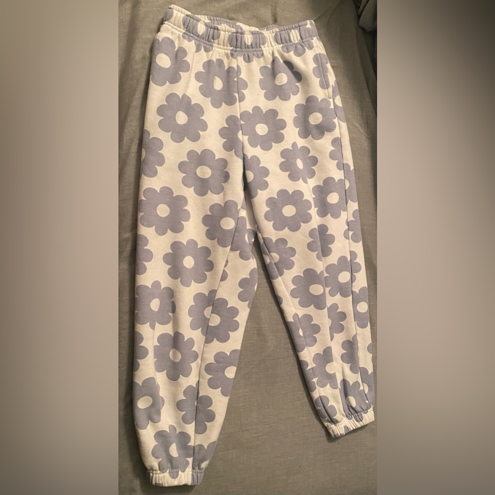 PacSun white sweatpants with baby blue flower pattern on them. Size: XS